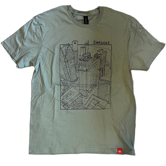 Green t-shirt with a cityscape graphic and 'Detroit' text on a wooden surface