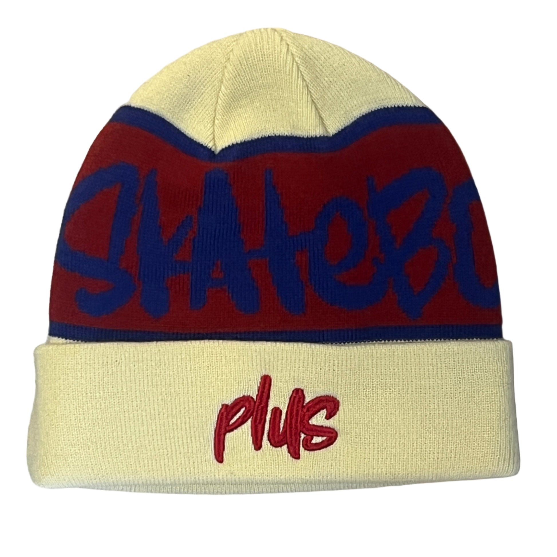 Beanie with 'Skater Plus' text on a wooden floor
