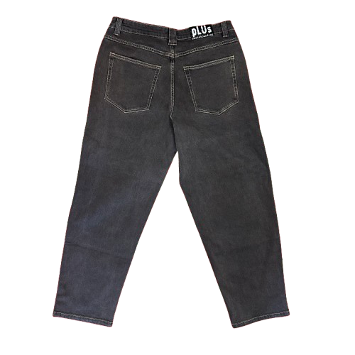 Rear view of black denim jeans with contrast stitching and a white 'PLUS' label on the waistband
