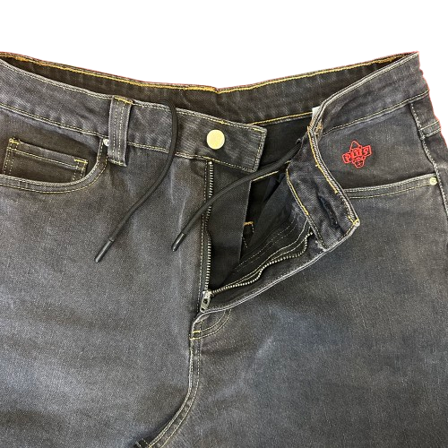Close-up of a pair of black denim jeans showing the front waistband, zipper, drawstring, and a red embroidered logo above the front pocket