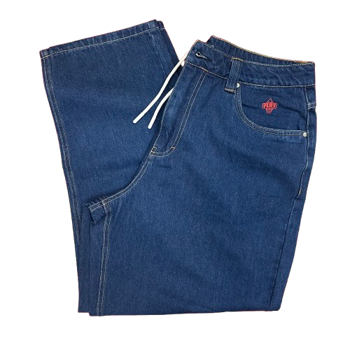 A pair of folded dark blue denim pants with a white drawstring and a small red embroidered logo on the front pocket