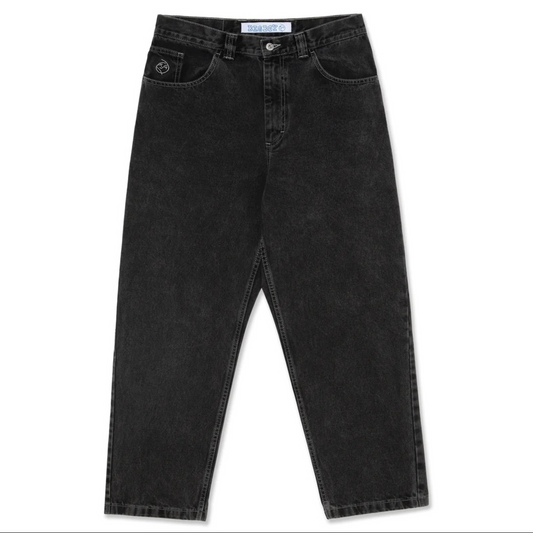 A pair of black washed denim jeans shown flat against a white background, featuring a classic five-pocket design and a small circular embroidered logo on the left pocket.
