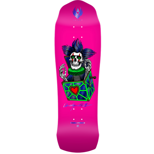 Pink skateboard deck with a colorful skull design on a white background