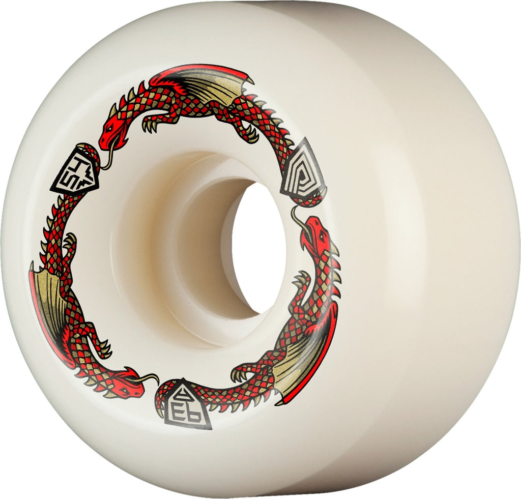 An off-white skateboard wheel featuring a circular graphic of two red and gold dragons winding around the inner hole, with black and white geometric logos on either side.