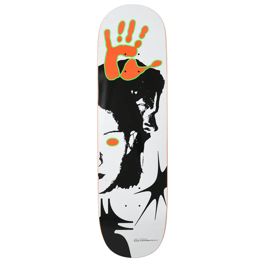 Skateboard deck with a stylized portrait and colorful hand print design on a white background