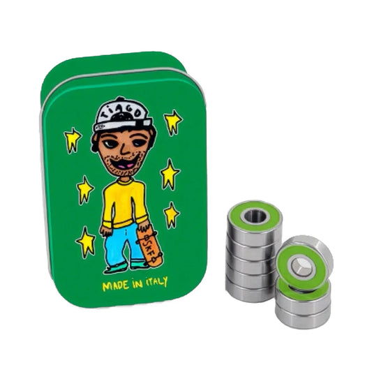 Green tin box with a cartoon character and bearings on a white background