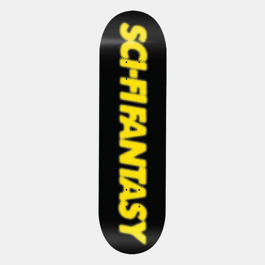 A skateboard deck with a black background and bold yellow vertical text reading 'SCIFANTASY' on a light gray studio background.