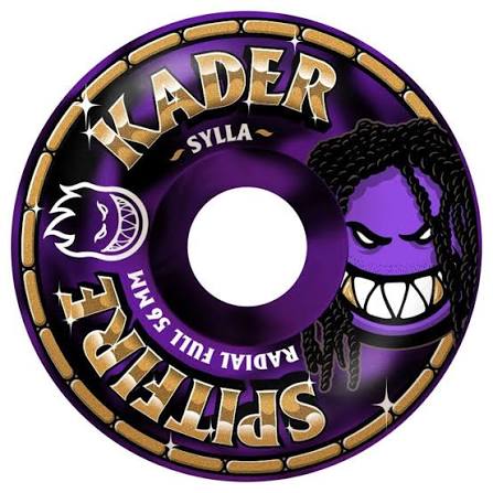 A single skateboard wheel with predominantly purple and metallic gold lettering that reads 'KADER' and 'SPITFIRE', plus a stylized purple cartoon face graphic and black braided hair.