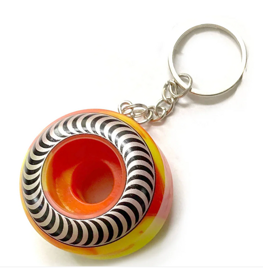 Keychain with a striped design on a white background