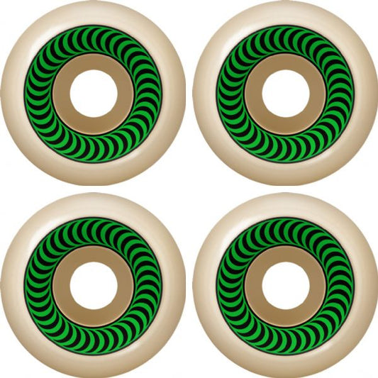 Four beige wheels with green and black pattern on a white background