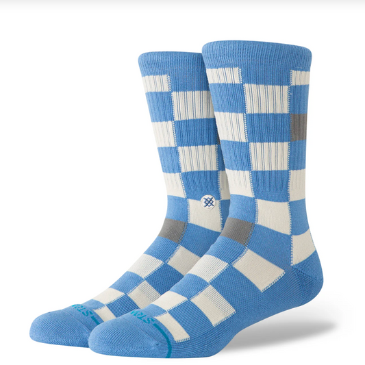Blue and white checkered socks on a white background