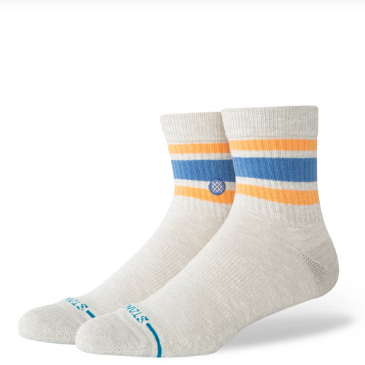 Pair of white socks with multicolor stripes on a white background