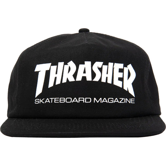 A black flat-brim snapback cap featuring the white 'THRASHER SKATEBOARD MAGAZINE' logo on the front, set against a plain white background.