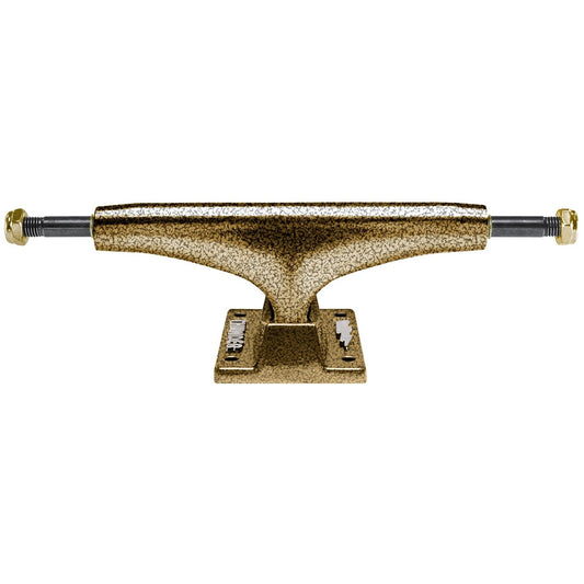 A single skateboard truck with a textured gold finish 