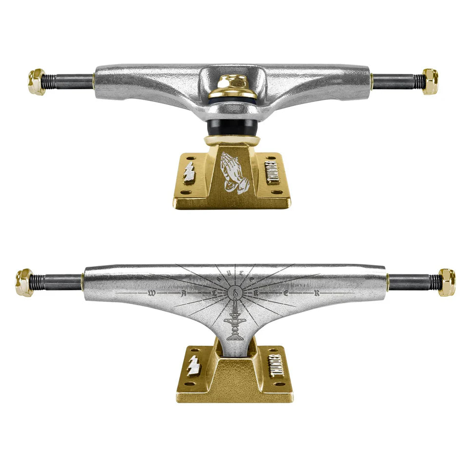Two skateboard truck assemblies on a white background