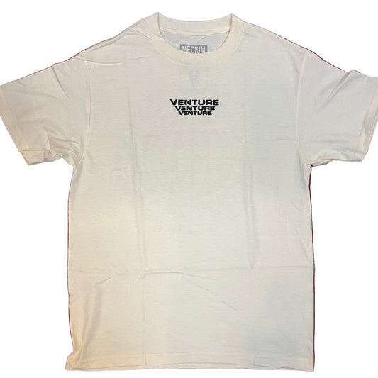 White t-shirt with 'Venture' text on a red and gray patterned surface