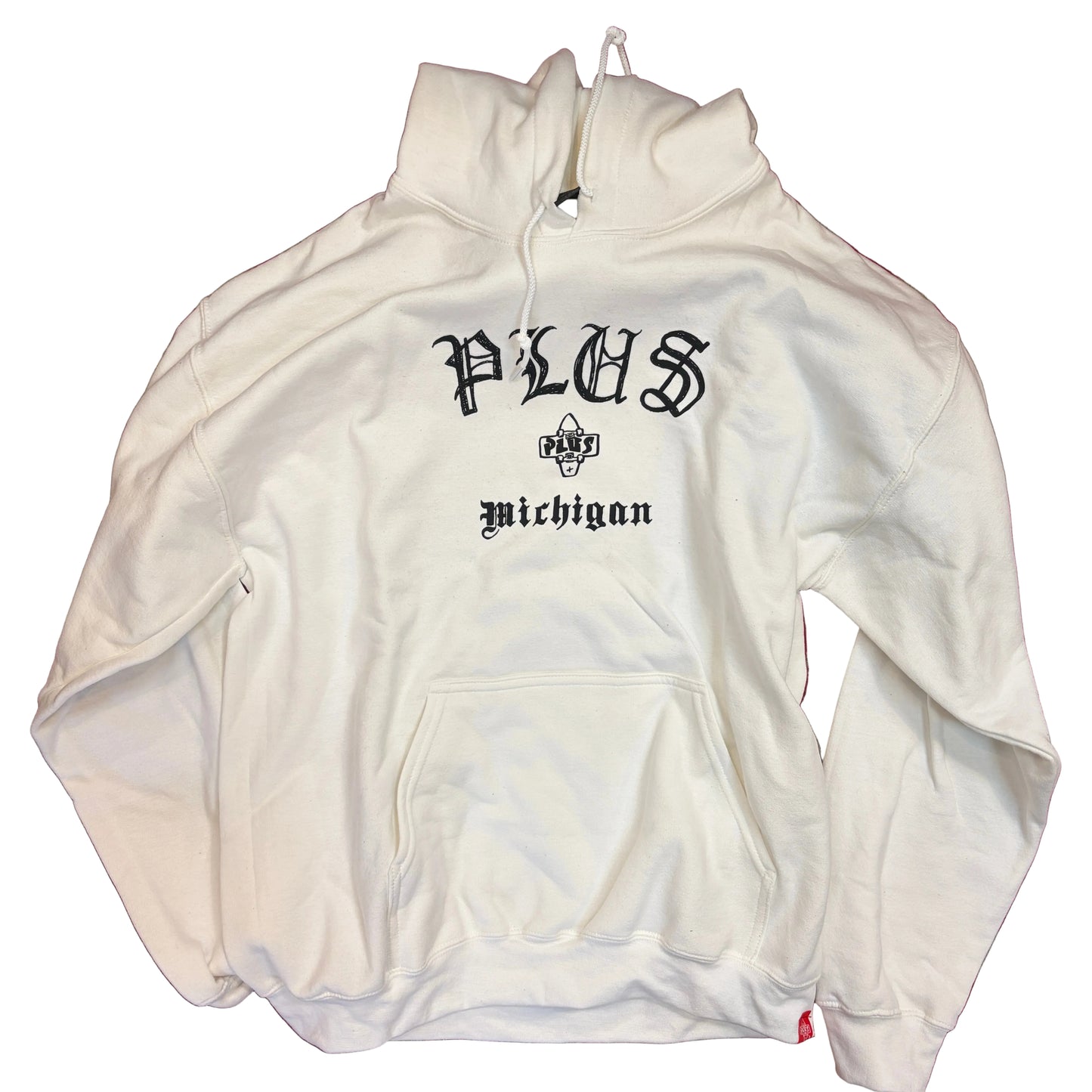 White hoodie with 'PLUS Michigan' text on a red and gray patterned surface