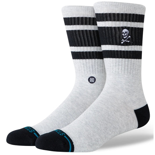 White socks with black stripes and skull design on a white background