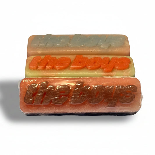 Three bars of wax with 'the boys' branding on a white background