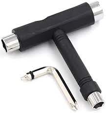 A black T-shaped skateboard tool with a metallic finish on the screwdriver ends.